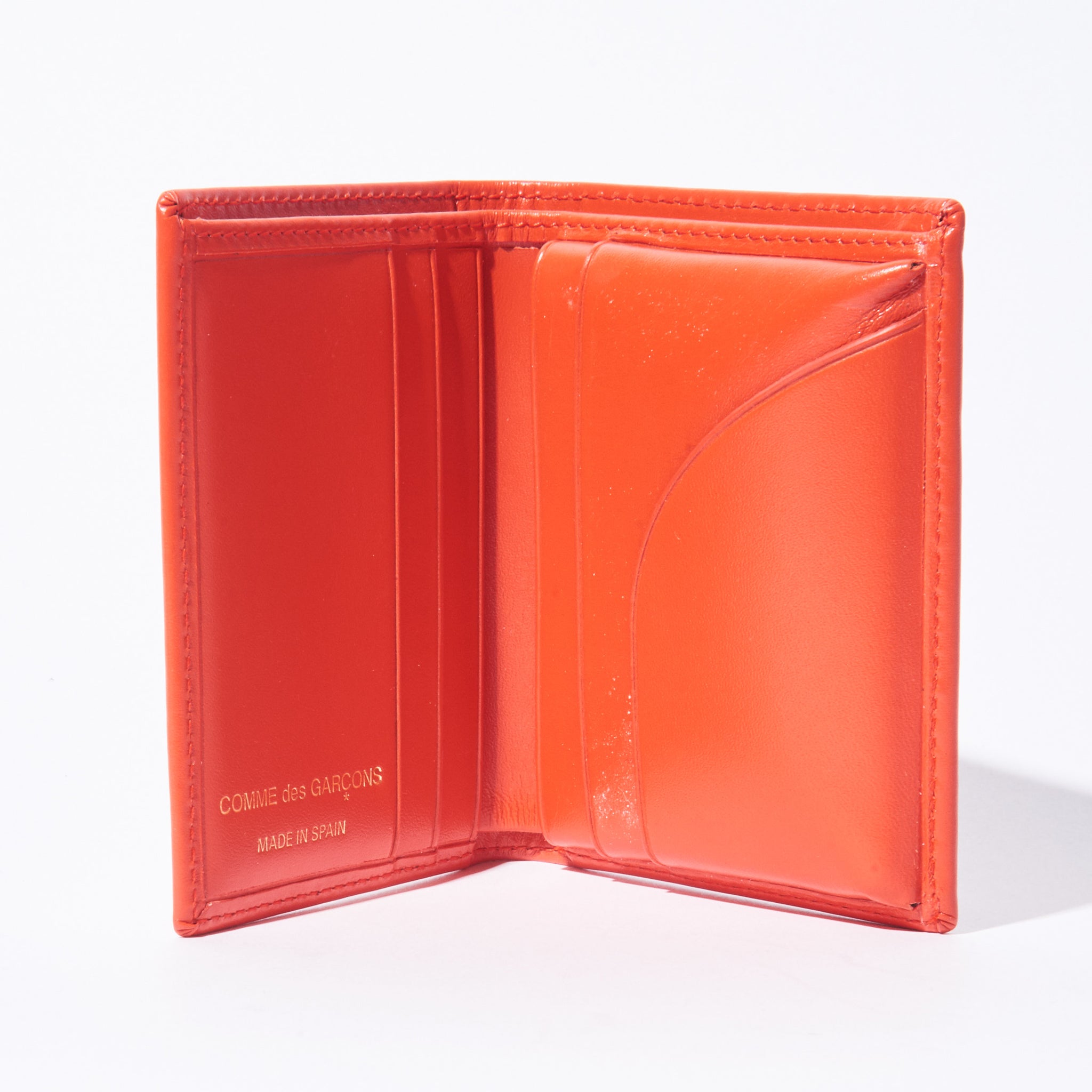 Comme Des Garçons - Orange Embossed Zip Around Wallet – Frances May