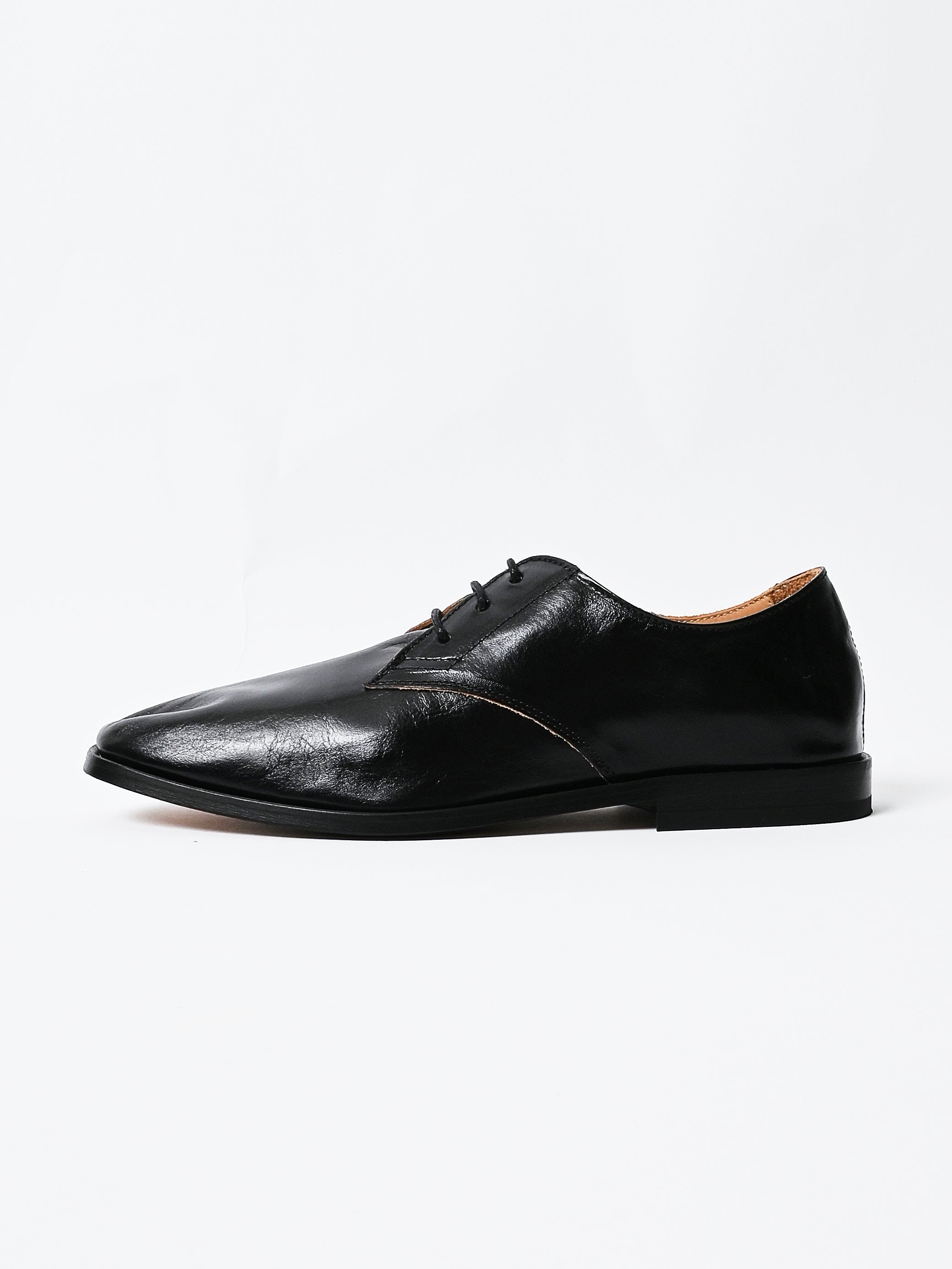 our-legacy-true-dye-black-
