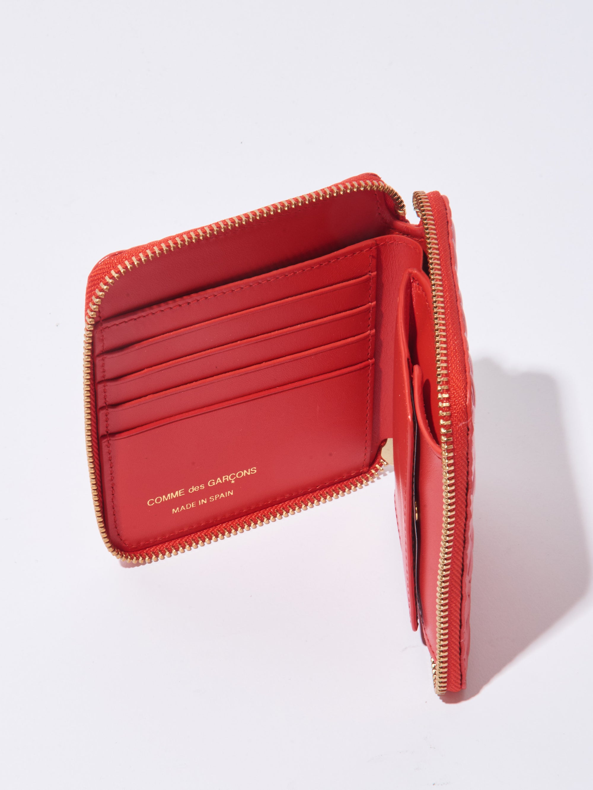 Comme Des Garçons - Orange Embossed Zip Around Wallet – Frances May